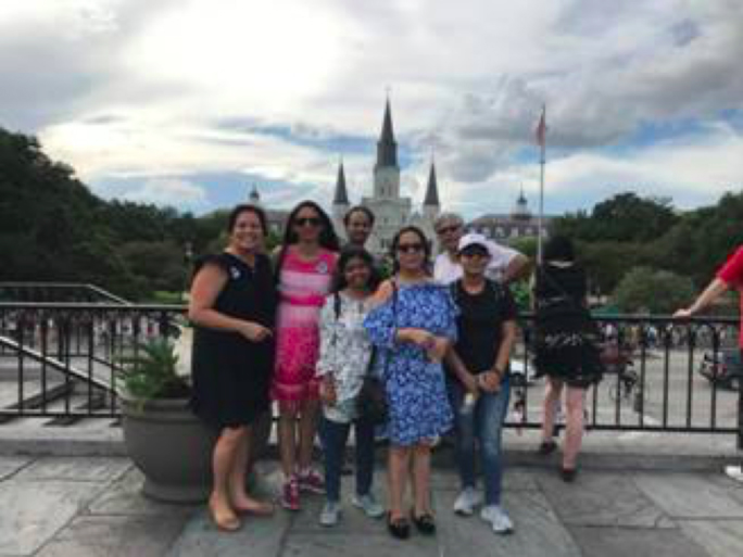 Brand USA India Global Office members posing with a castle in the background