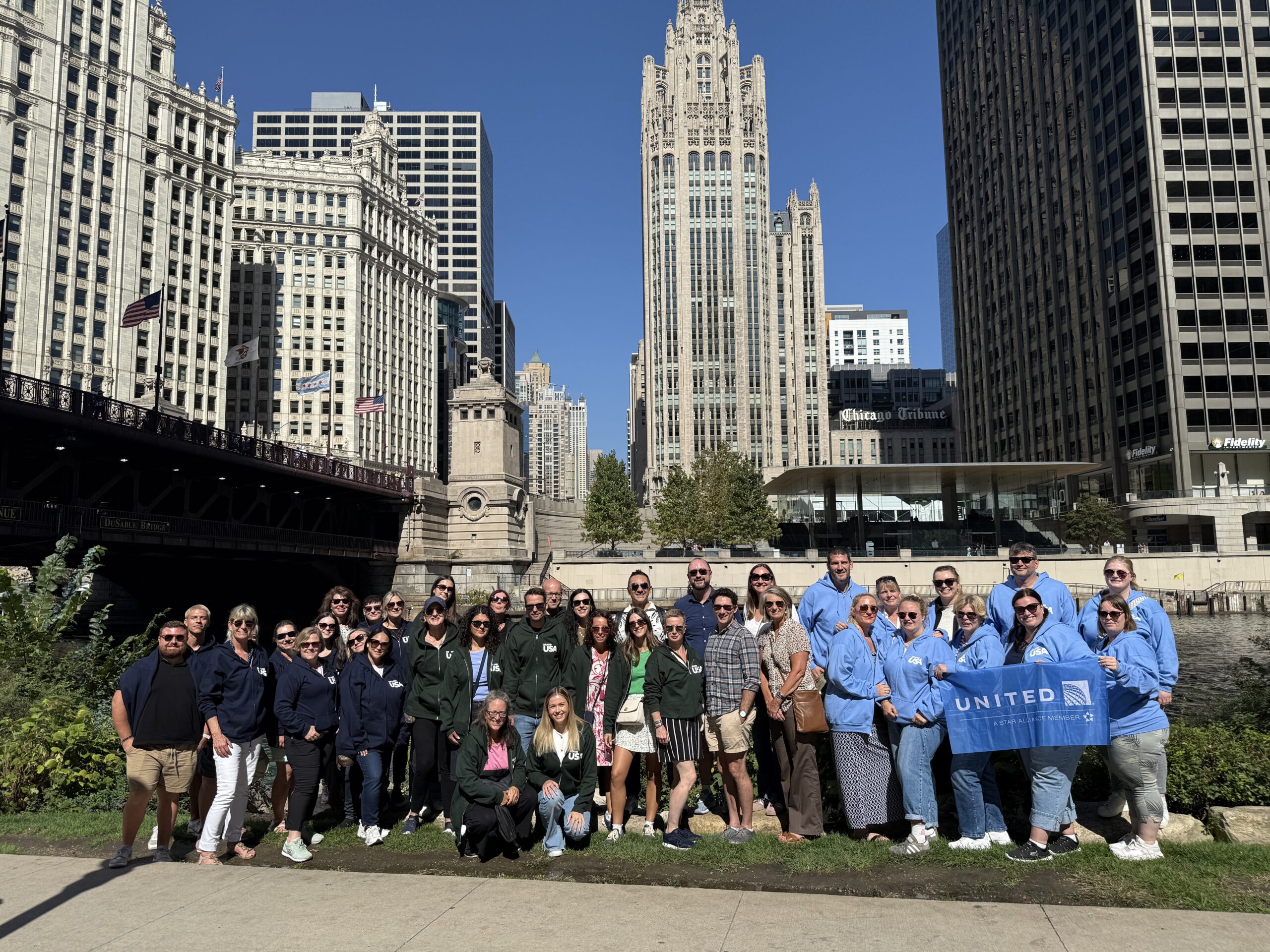 Group of tourists at a city landmark in the Midwest USA.