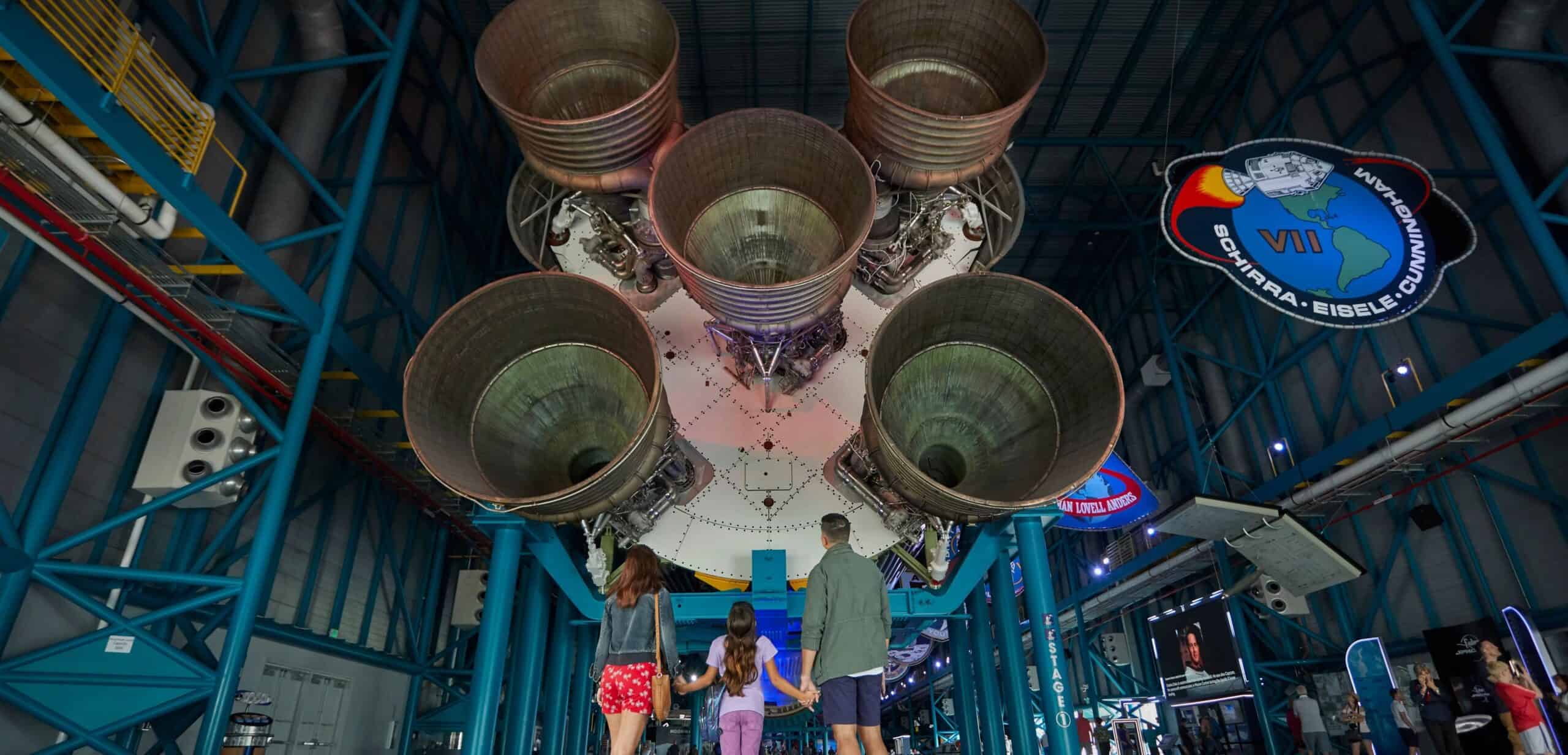 Visitors viewing the Artemis II rocket at the Kennedy Space Center.