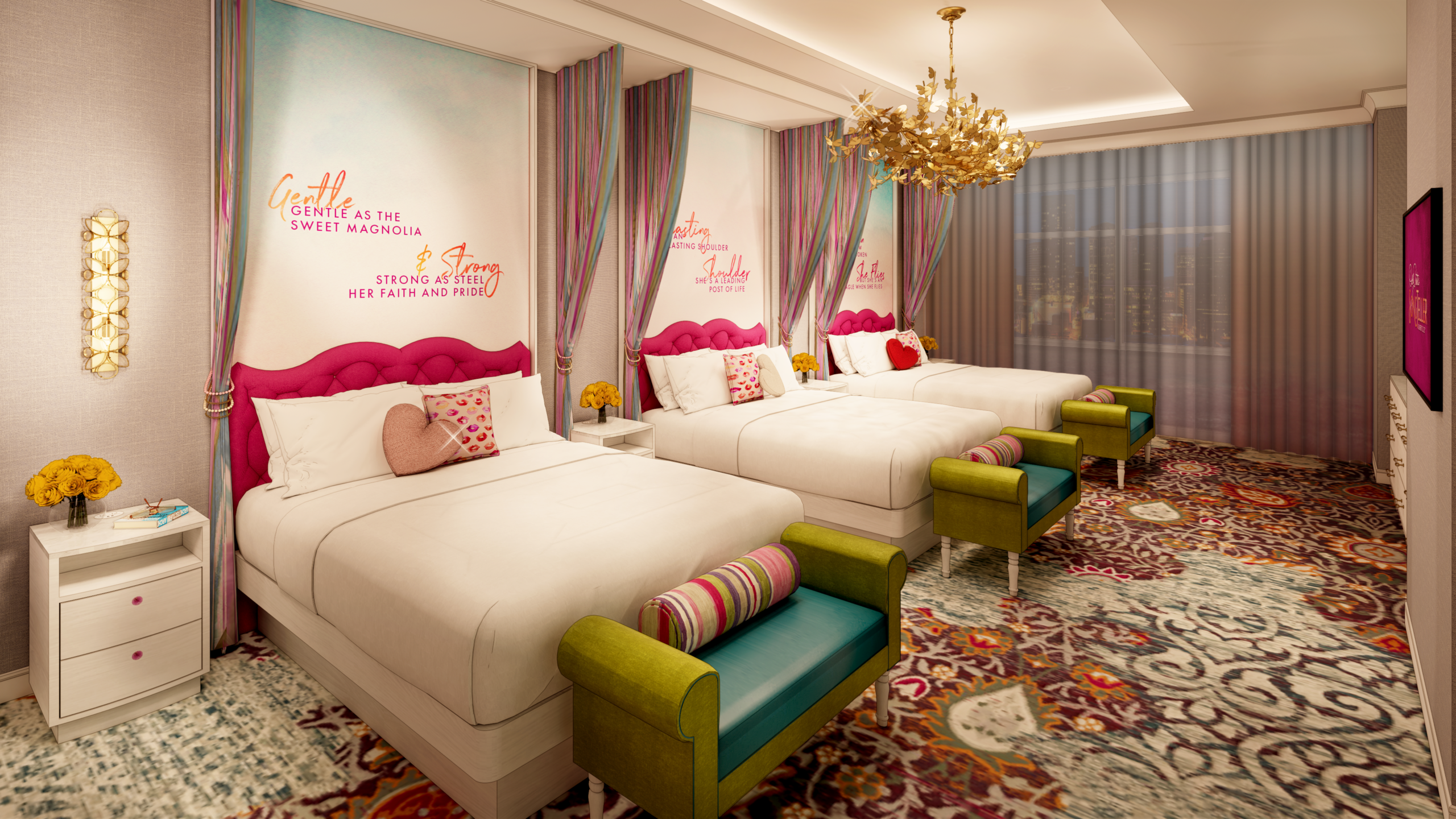Three double beds with pink headboards in a colorful, ornate hotel room with floral wallpaper, rugs, gold chandelier, and decorative pillows and benches at the bed ends.